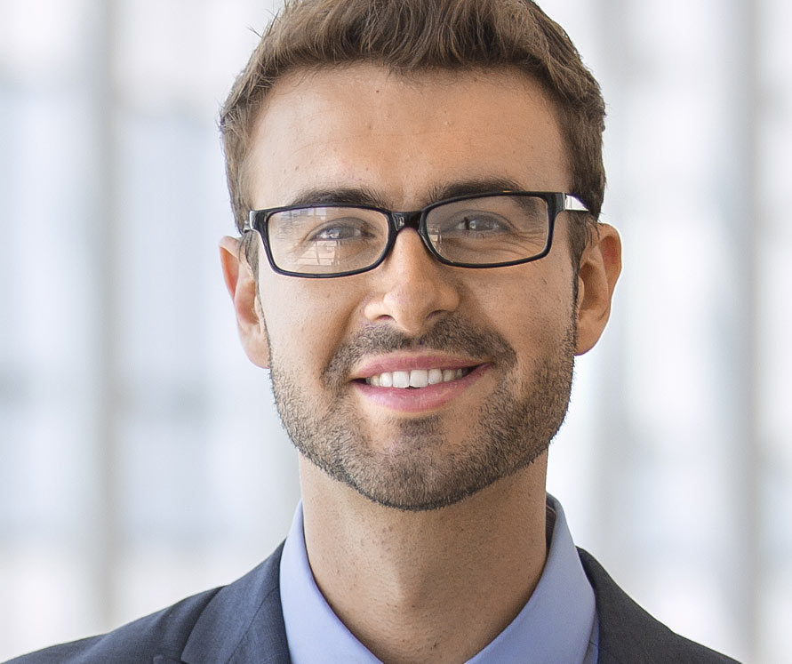 Man Smiling 1 - Furmanagers EMERSON BURNS