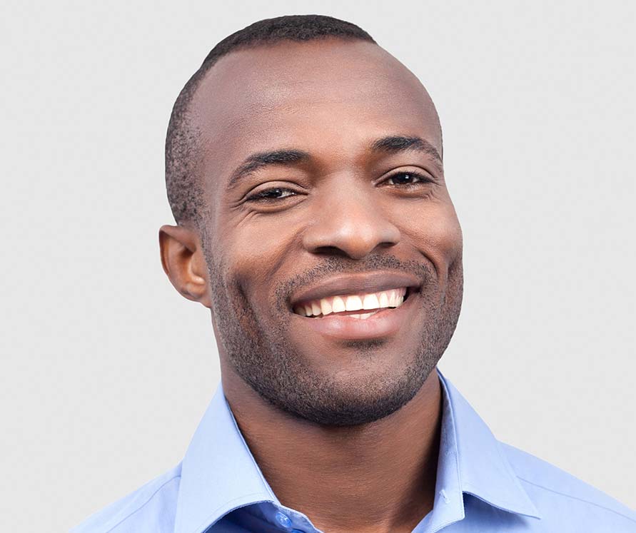 Man Smiling - Furmanagers LEE MILLER