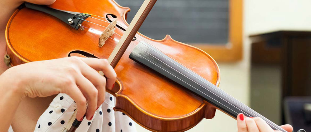 Person Playing Violin